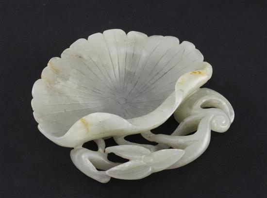 A Chinese pale celadon jade lotus leaf brush washer, 9.1cm